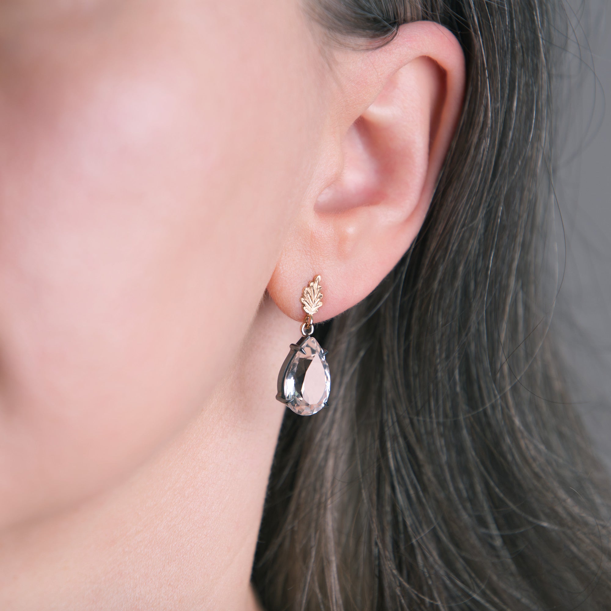 One-of-a-kind 18K gold earrings with blackened silver and white topaz by Ewa Z. Sleziona