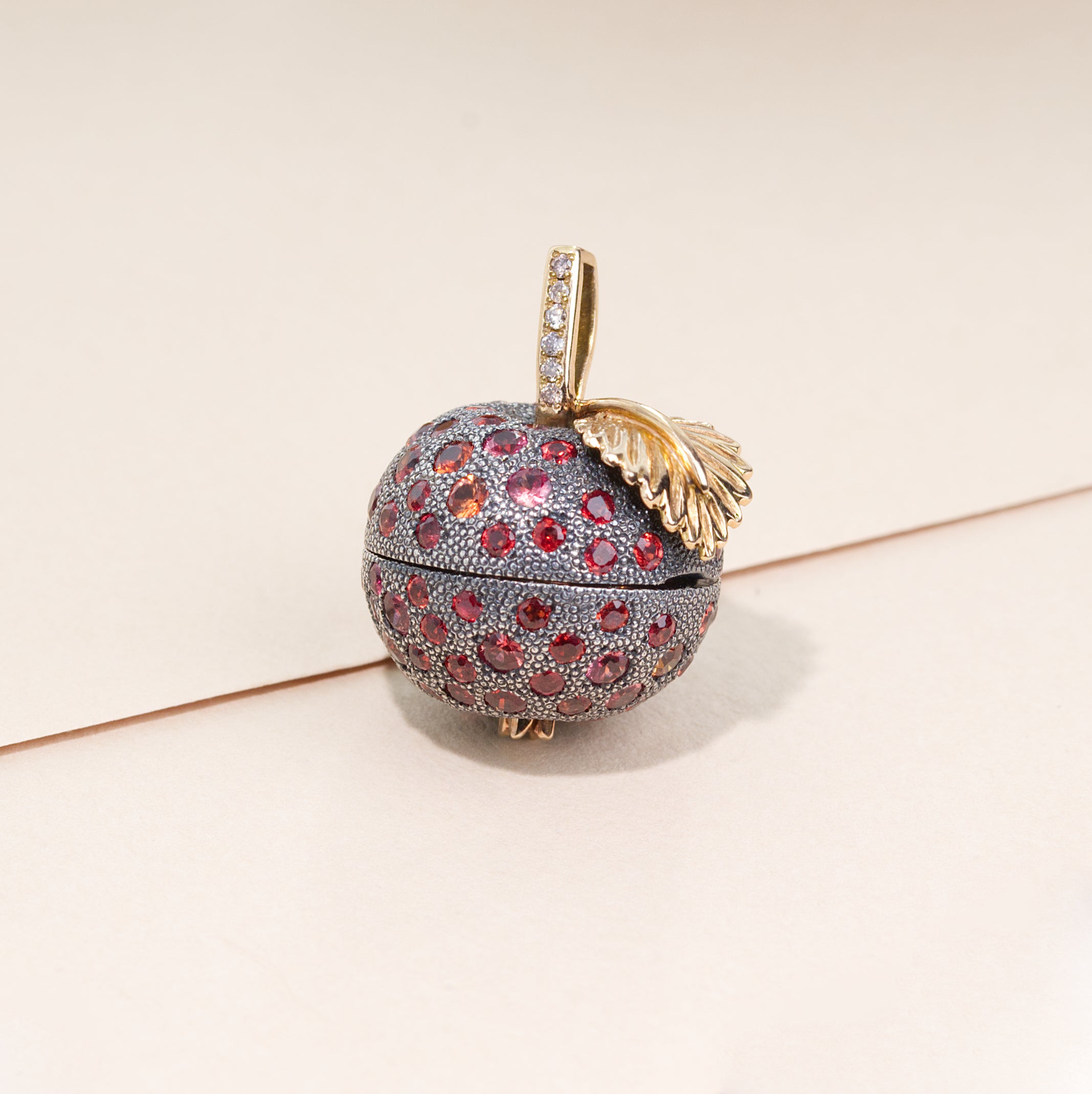 Red Sapphire Apple Locket by Ewa Z. Sleziona Jewellery