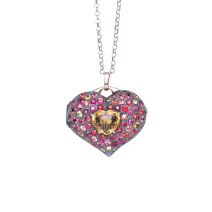 Heart locket in 18K gold, sterling silver with fancy sapphires and heliodor